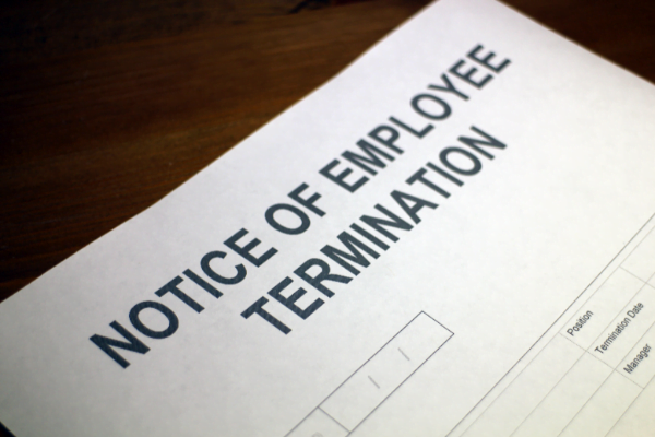 Paper that reads "notice of employee termination"