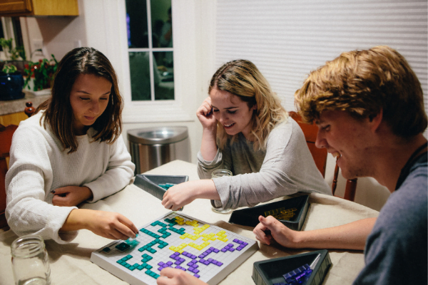 Friends playing scrabble